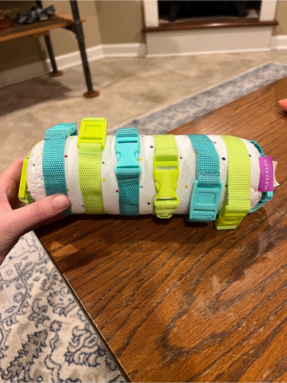 Lovevery Buckle Barrel Roll Toy in Aqua & Lime – Fine Motor Skills Toy